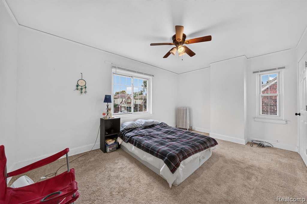 Bedroom with ceiling fan at 19178 San Juan Dr